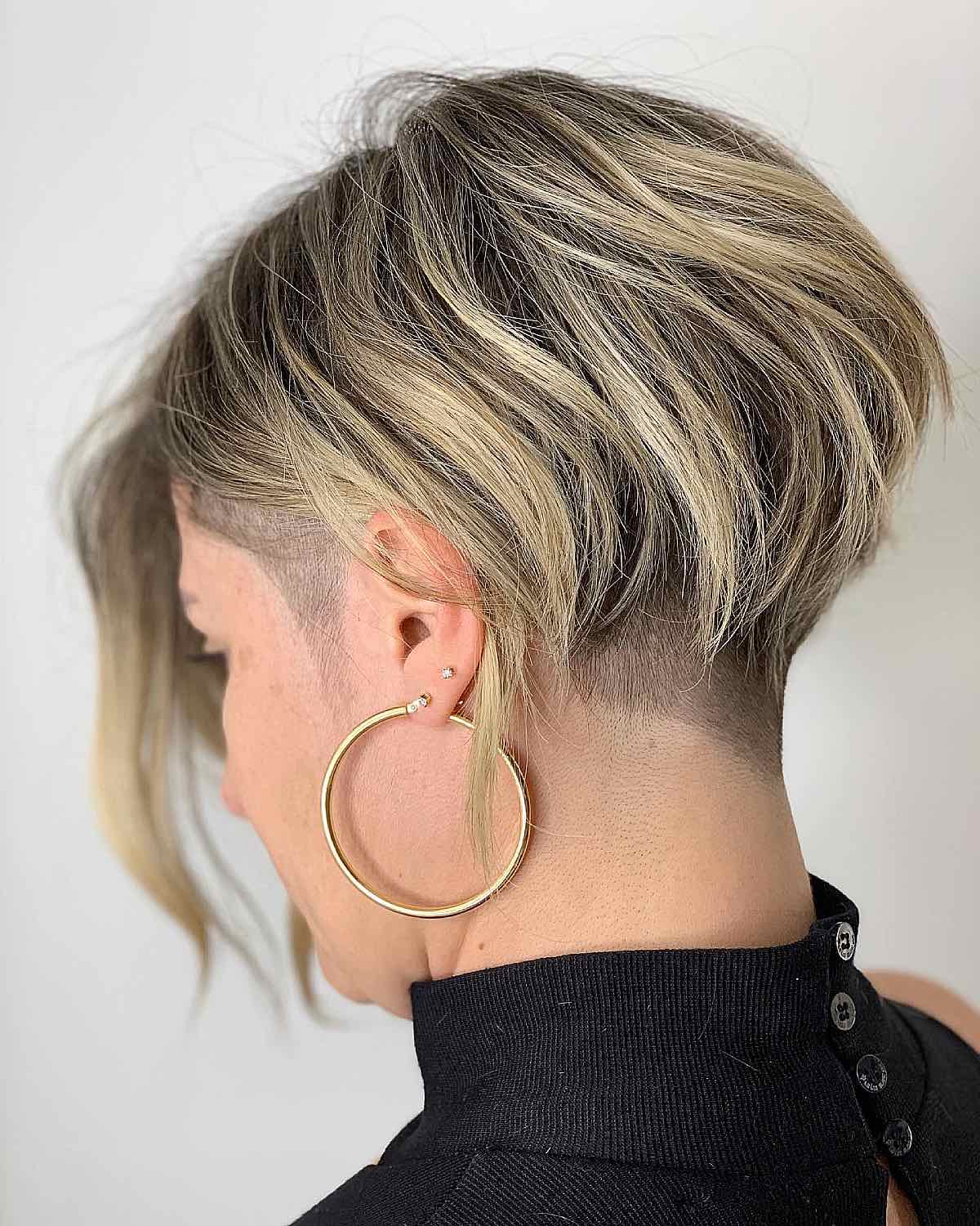 Trendy blonde short hair with an undercut