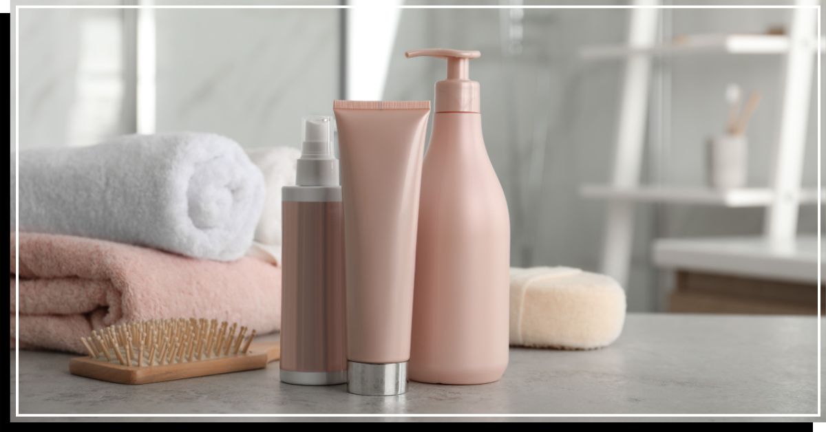 Bottles of styling products on a bathroom counter