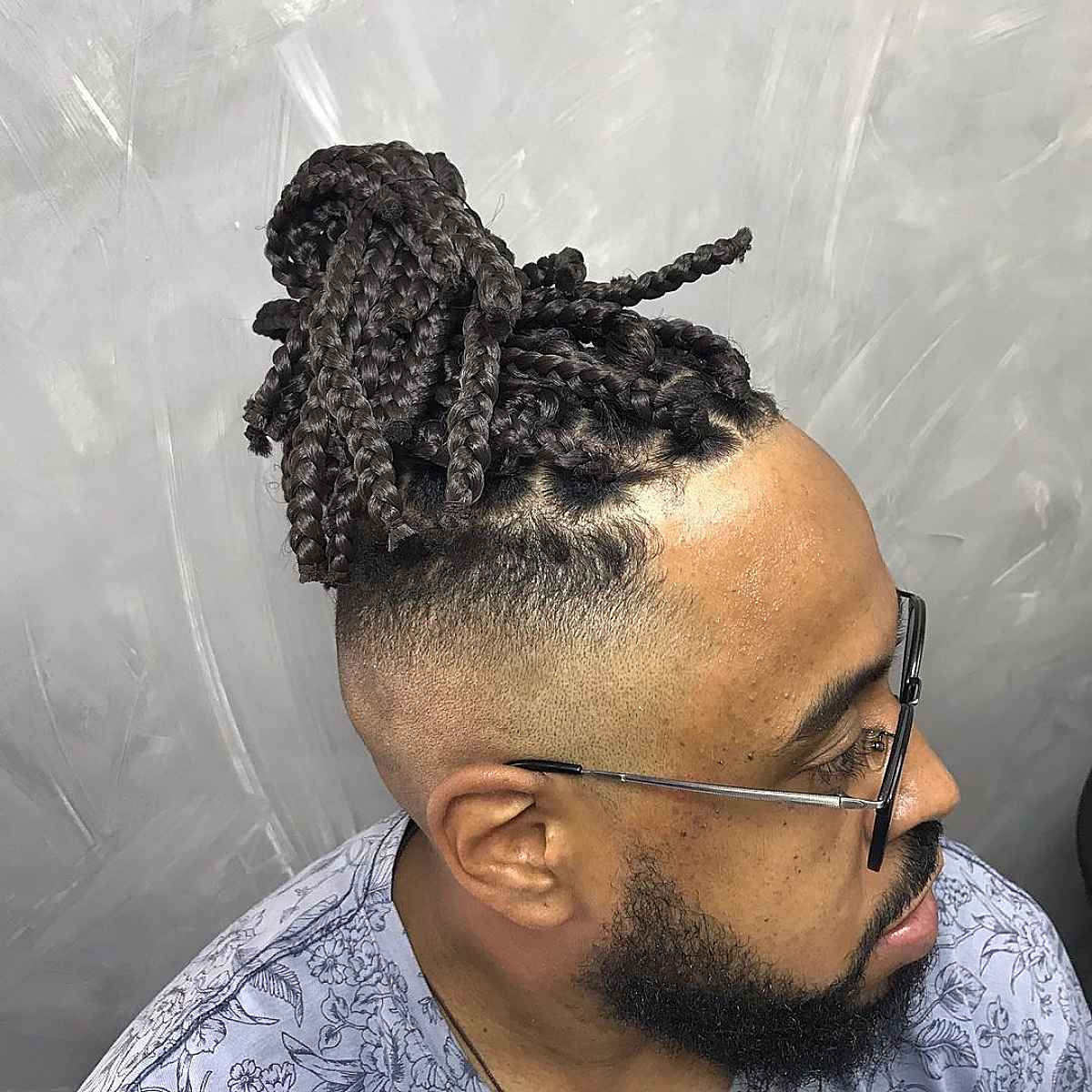 Box braids man bun