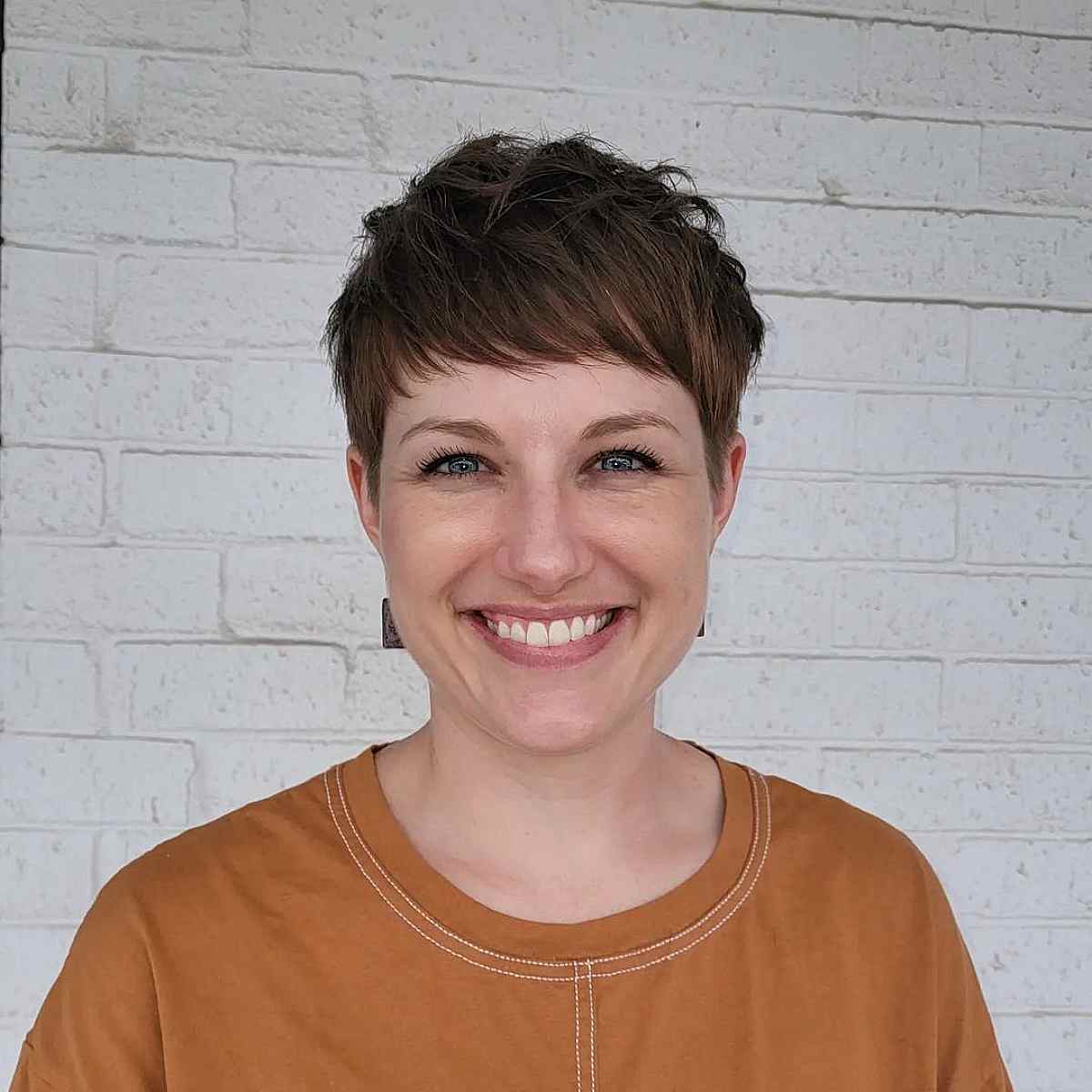 Subtle Brunette Pixie cut and color