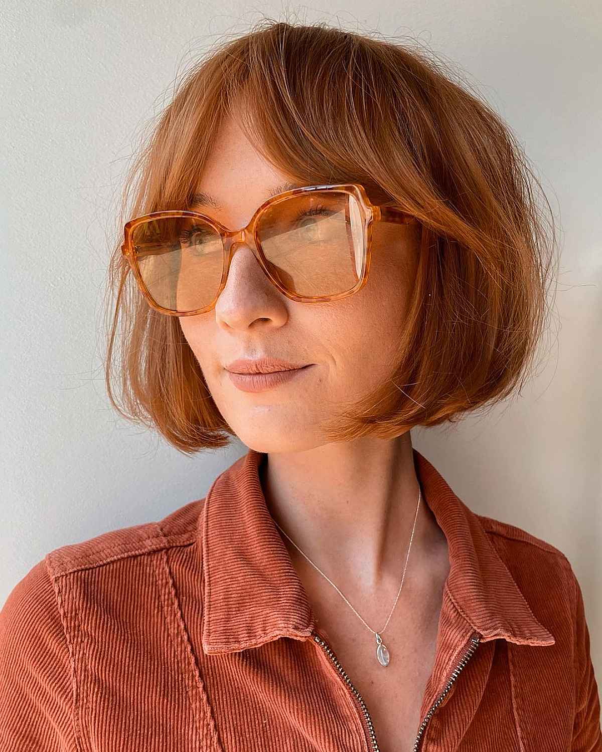 Chin-Length Bob with Curtain Bangs