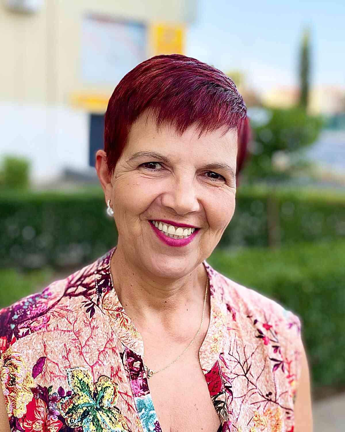 Choppy Red Pixie with Textured Bangs for Thick Haired Ladies Aged 70