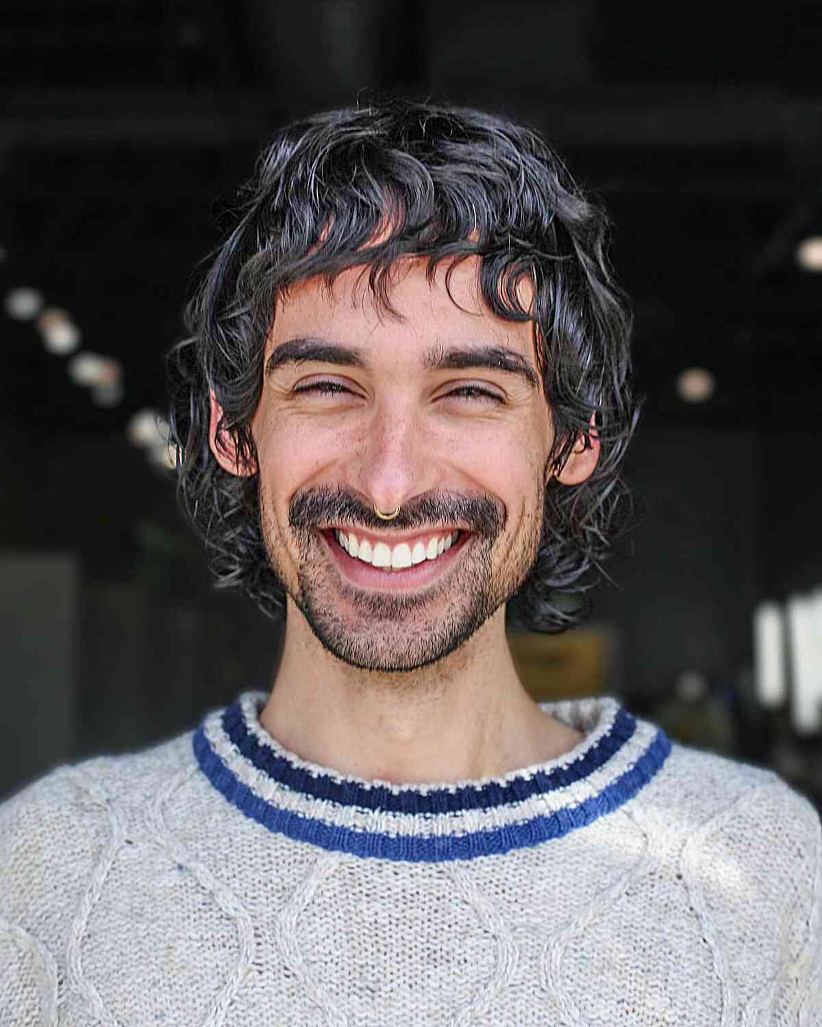 Cute and Messy Mullet with Bangs for Guys with Medium-Length Hair