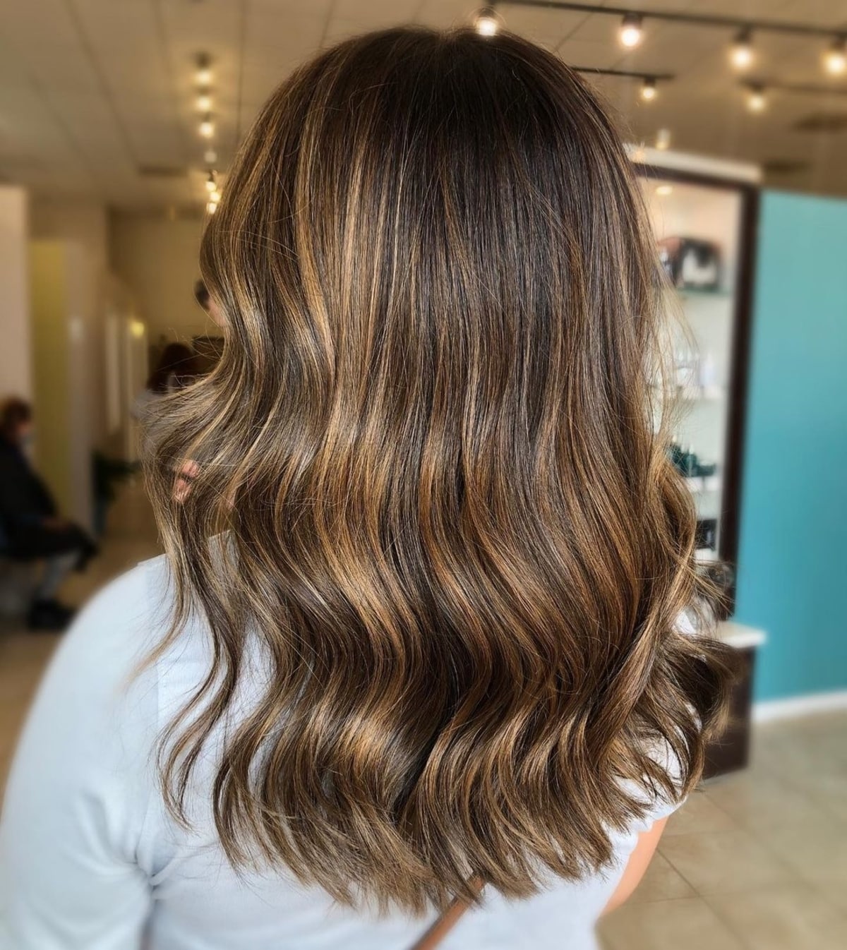 Dimensional bronze balayage for brown hair