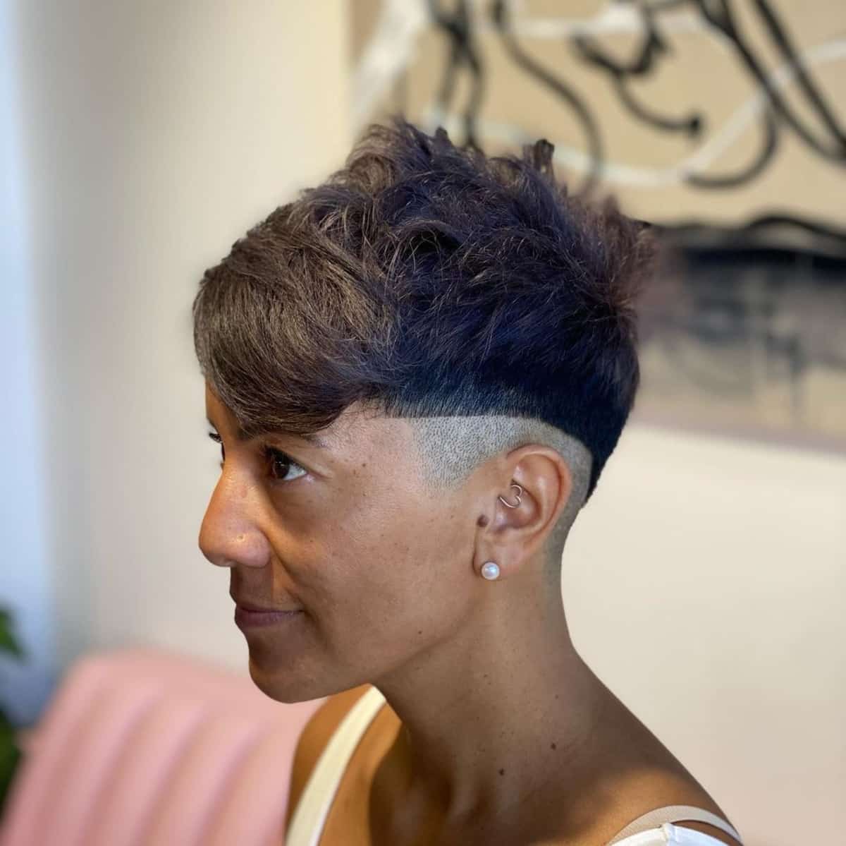 Edgy diagonal undercut haircut for women