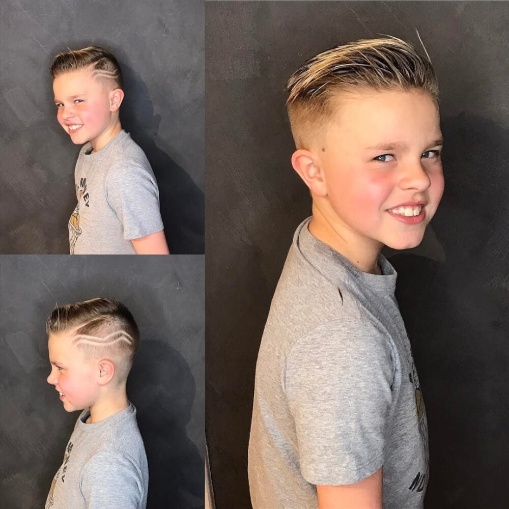 A trendsetter high fade haircut with lines on the side