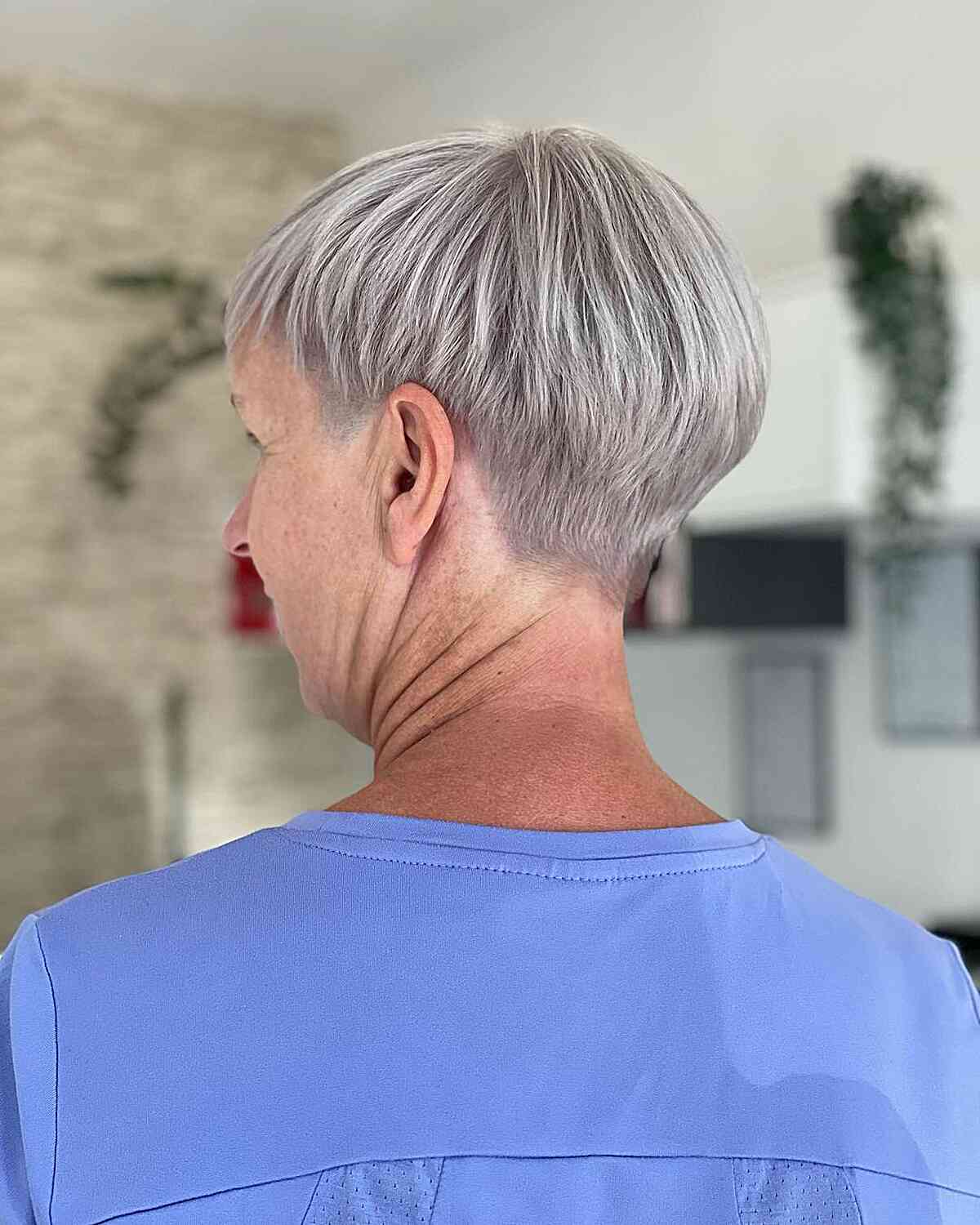 Short Glossy Grey Pixie Hair on Mature Women