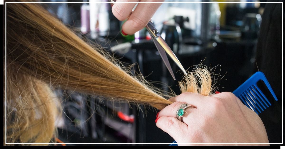 Hair with split ends being trimmed