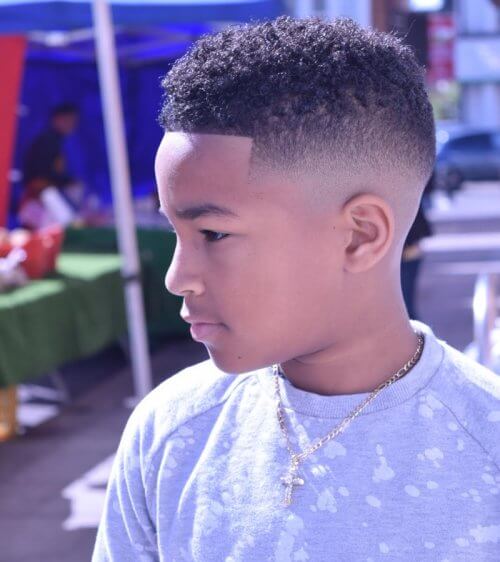 A retro high top fade for young black boys