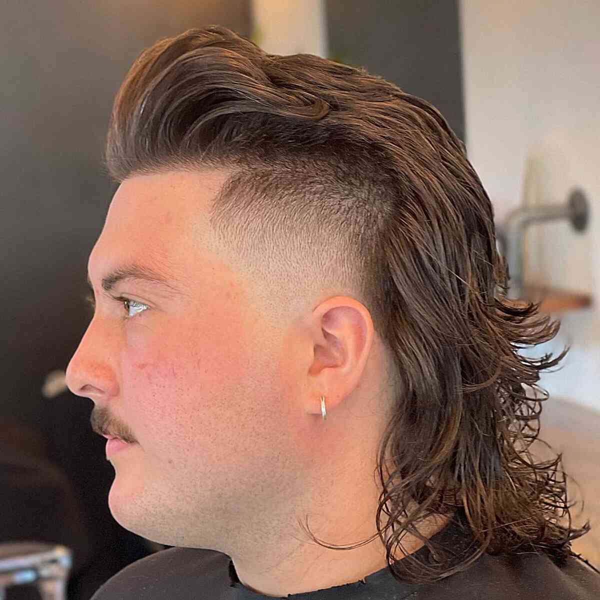 Long Wavy Hair with Skin Fade Undercut