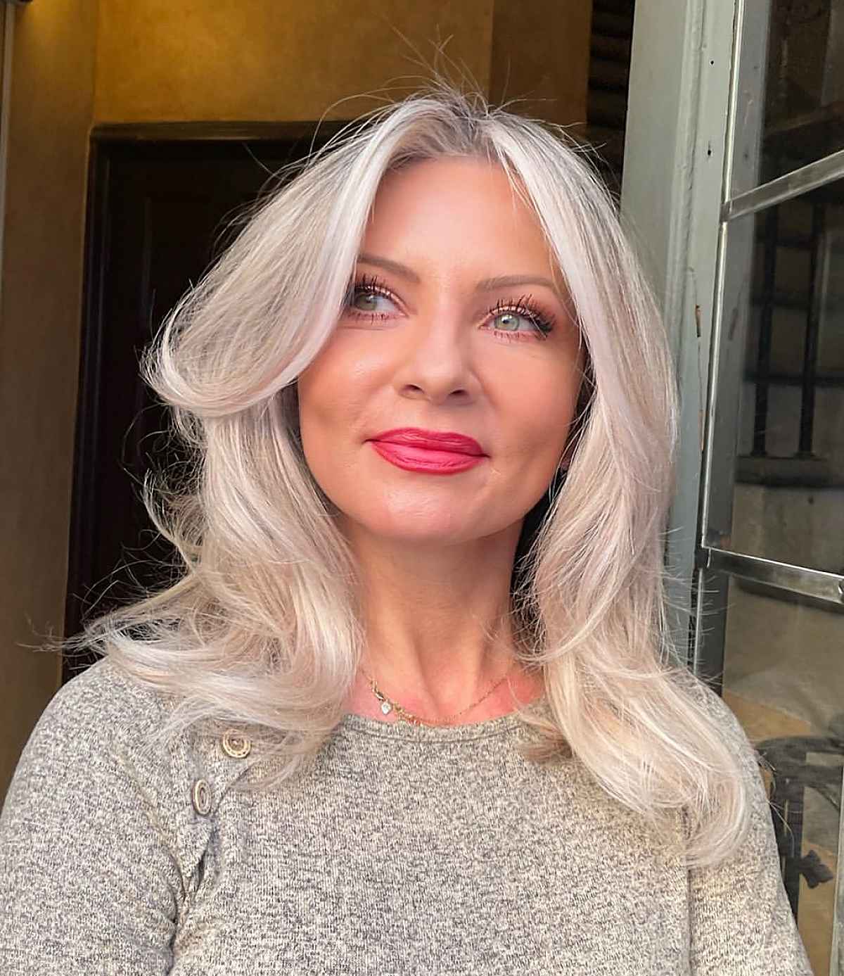 Medium Face-Framing Haircut with Platinum Highlights