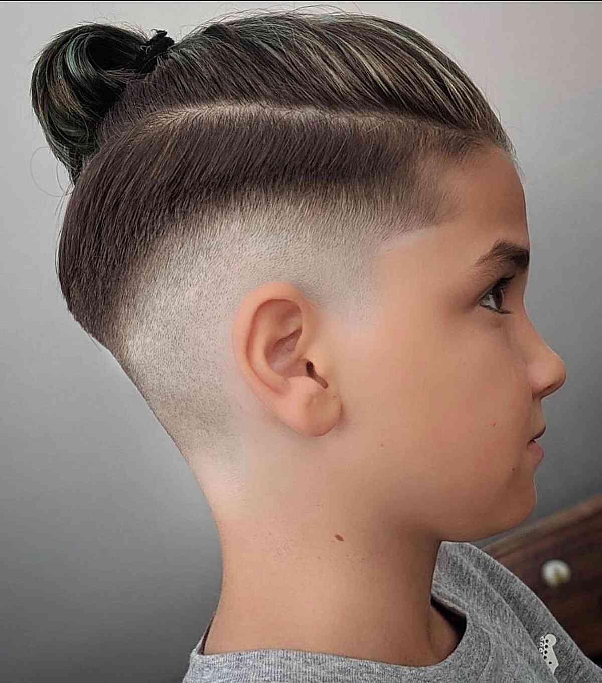 Mid Fade with a Man Bun for Boys