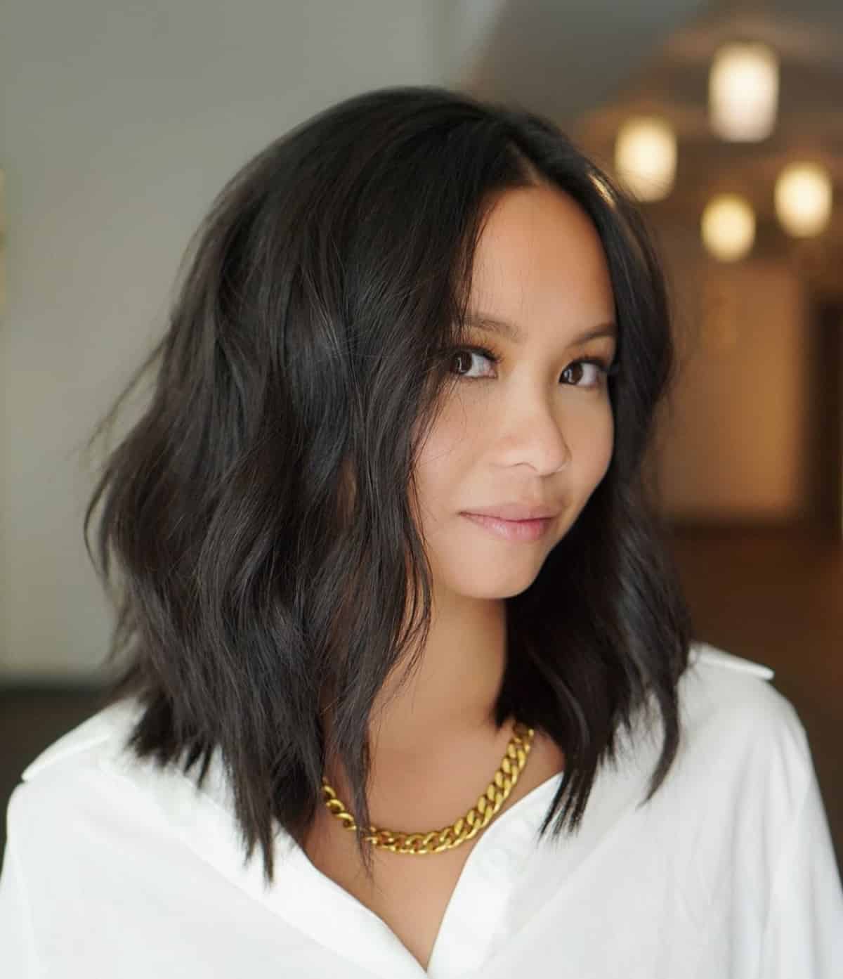 Modern wavy lob cut for thicker hair