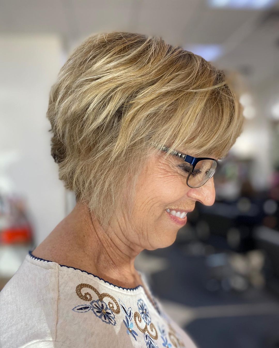 Old woman over 70 with a stacked bob haircut