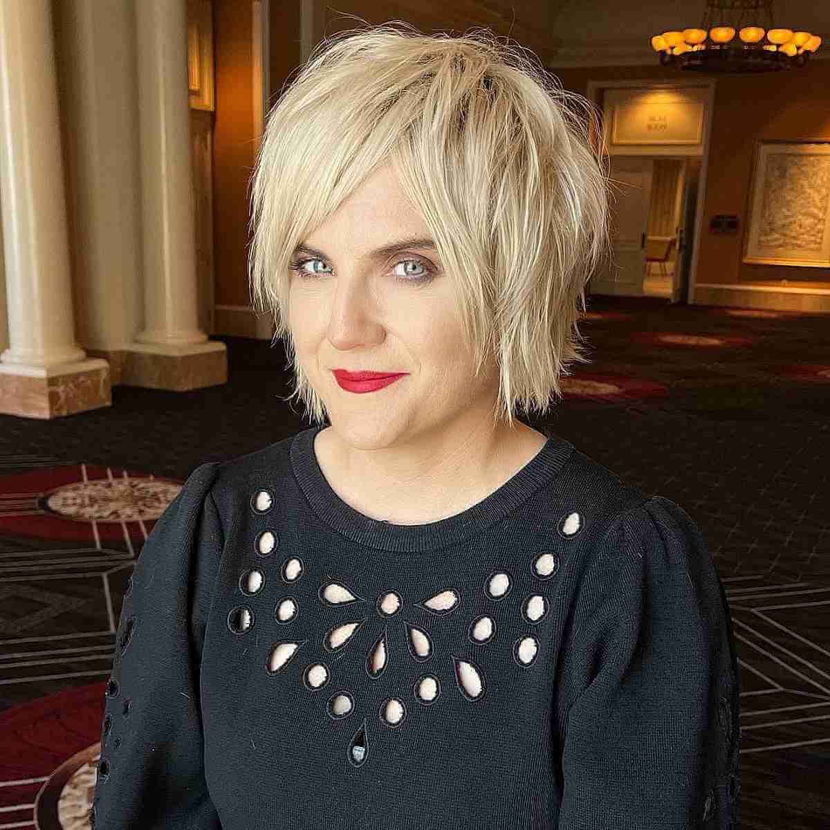 Pixie Bob with Razored Layers and Bangs for Women Over Forty