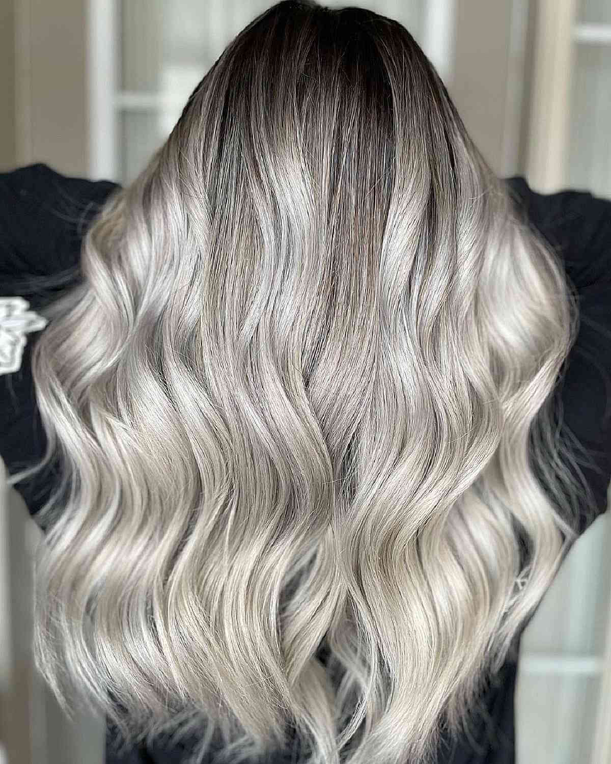 Trendy Platinum Blonde Babylights with Dark Roots