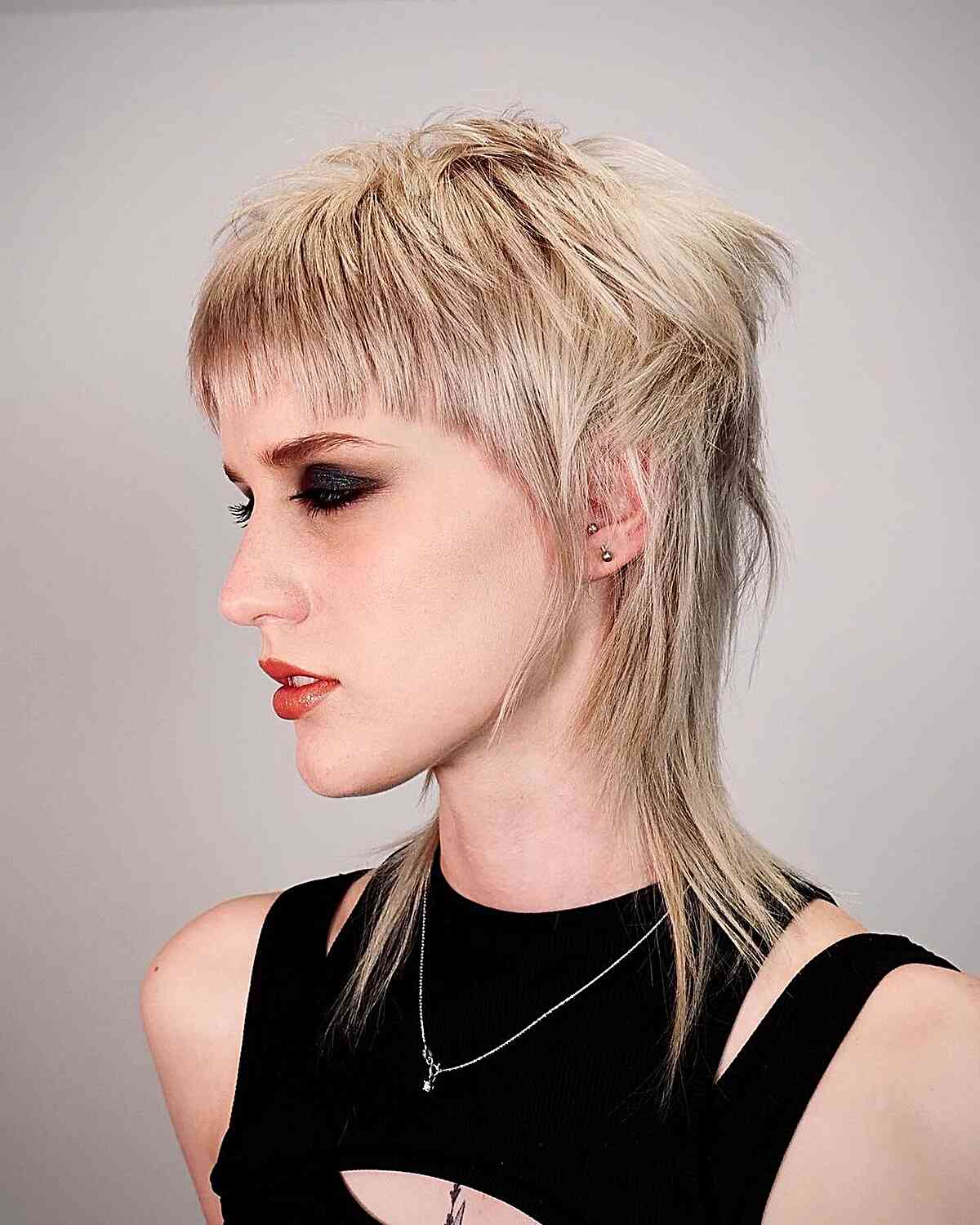 Punk-Inspired Choppy Shaggy Mullet Cut