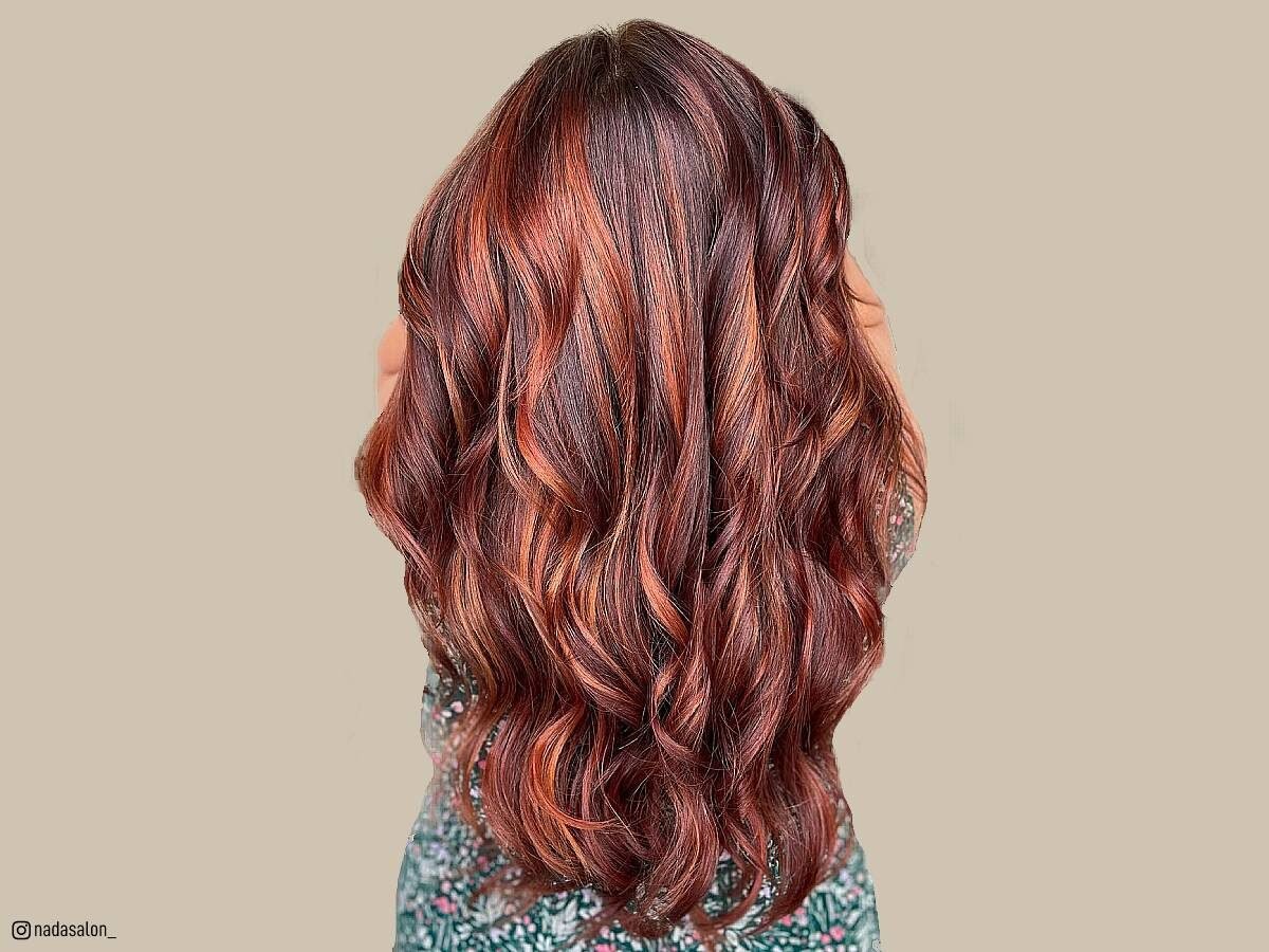 Red balayage on brown hair