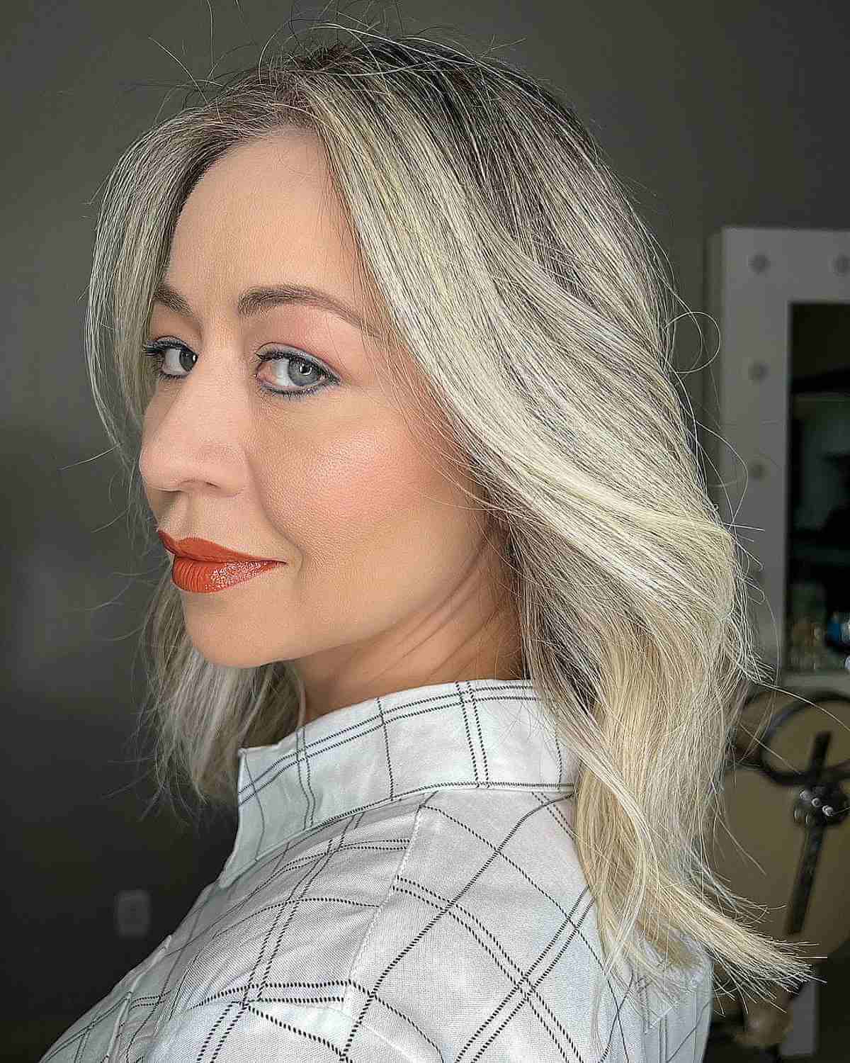 Rooted Blonde Balayage on a Medium Haircut for Ladies Past 40