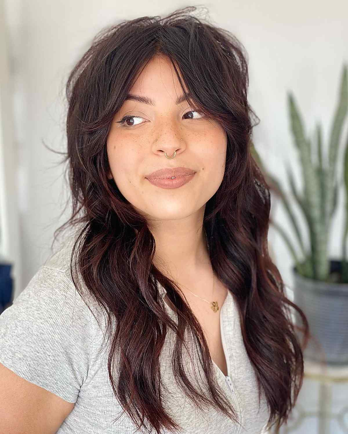 Deep brown shag haircut with beach waves