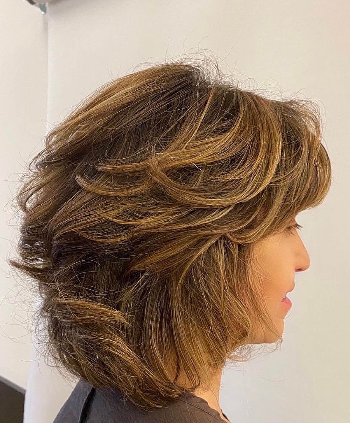 Amazing short feathered bob cut