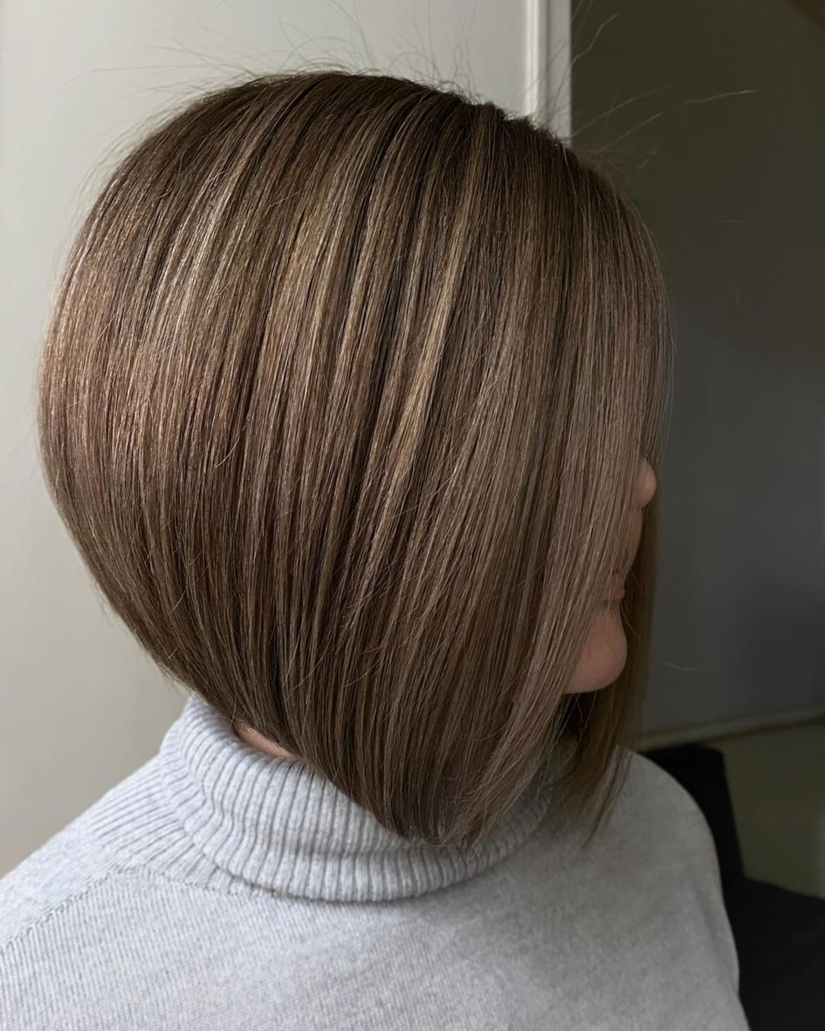 slightly inverted bob cut