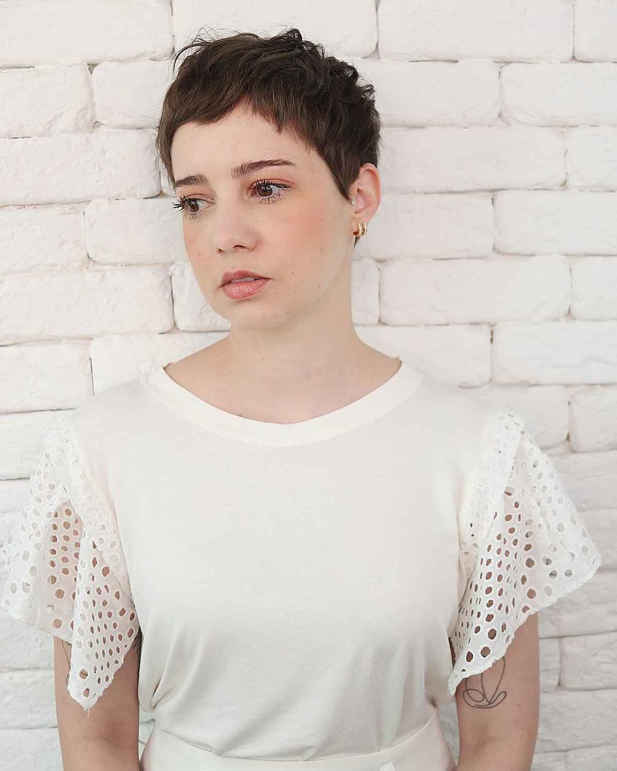 very short pixie with micro side bangs