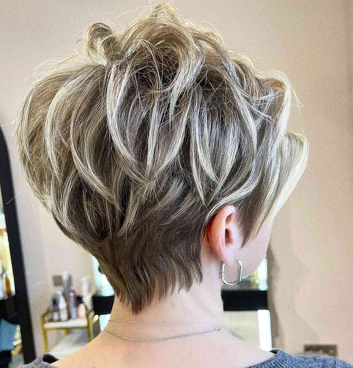 Voluminous Layered Bob Cut at Ear-Length